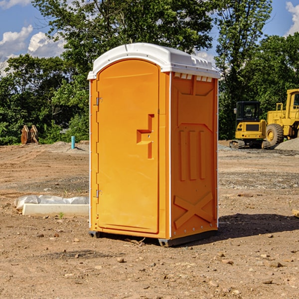 how often are the portable restrooms cleaned and serviced during a rental period in Port Washington North